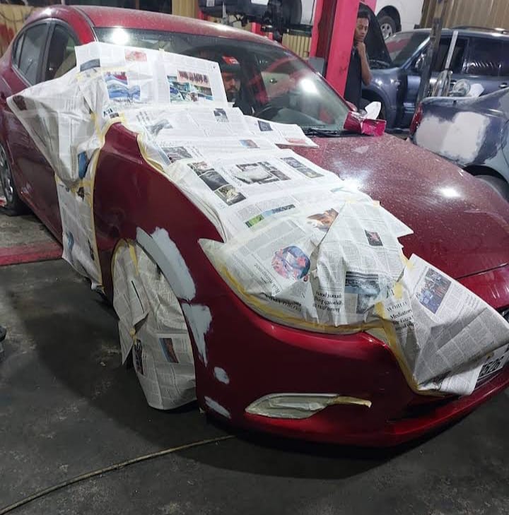 Before and after car dent repair and paint service in Dubai